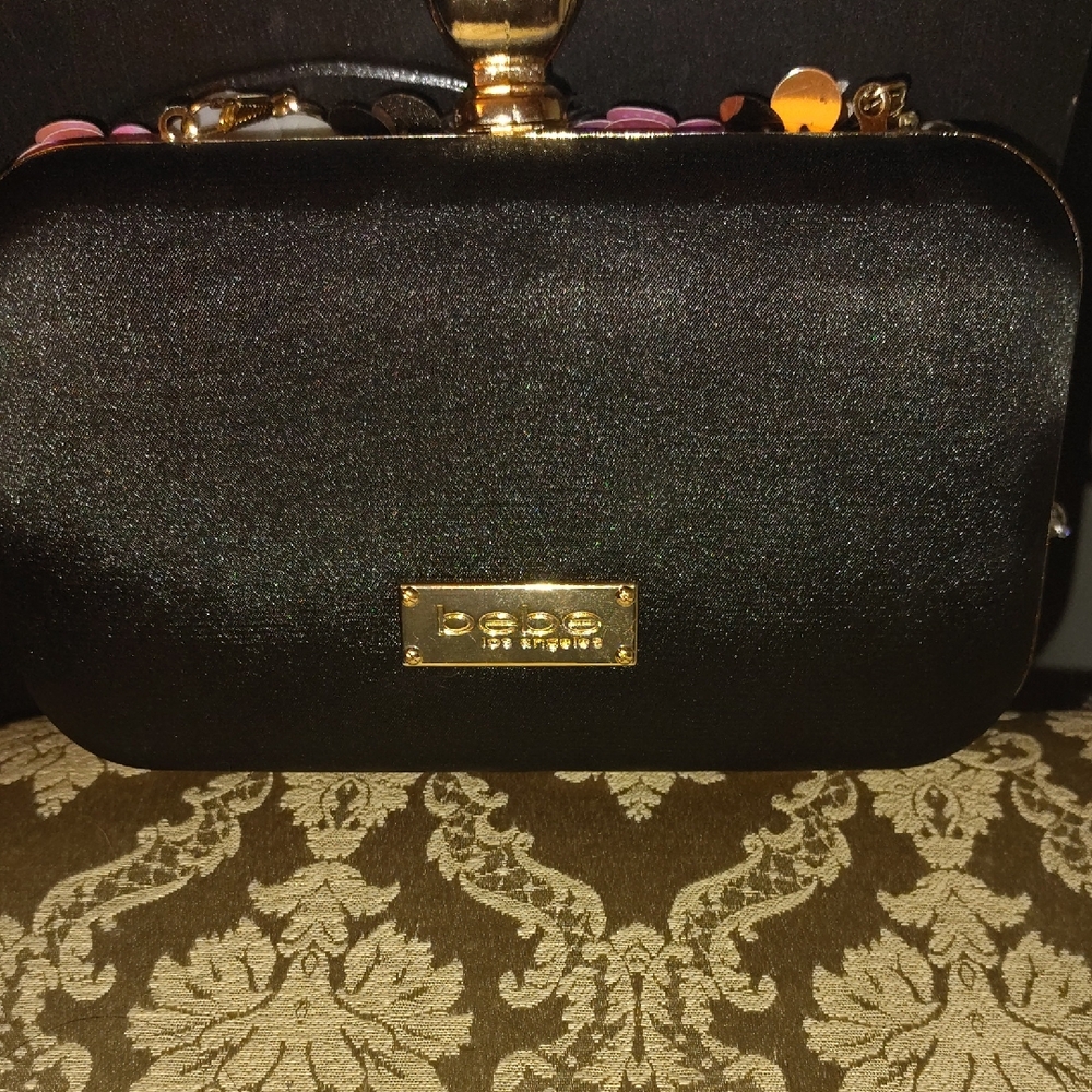 Bebe Black and Gold Clutch